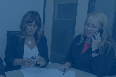 brandy lake and michele seibold with the seibold group working on a clients transaction